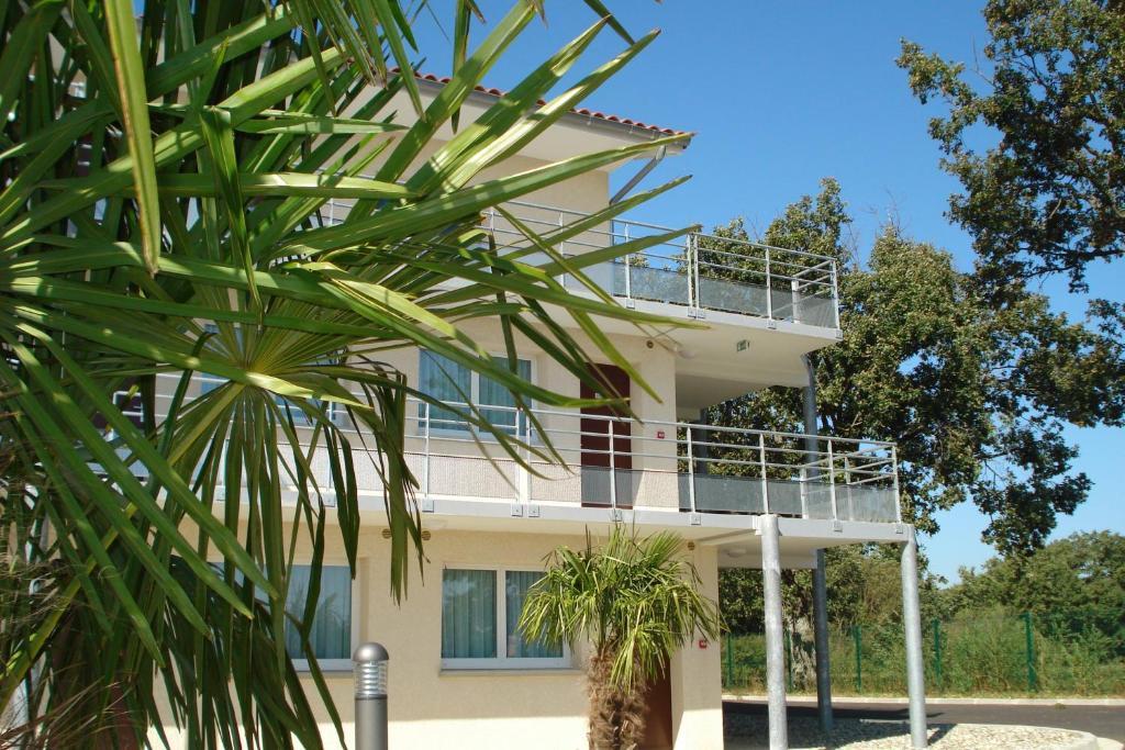 Hotel La Palmeraie Cornebarrieu Esterno foto